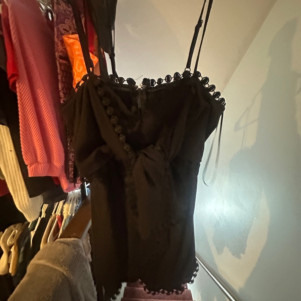 Black ruffled rhomper